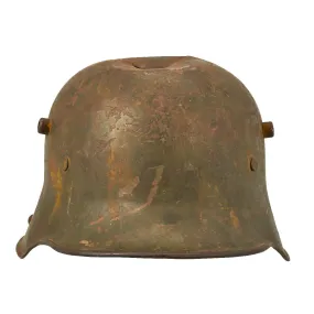 Original German WWI Battle Damaged M16 Stahlhelm Helmet with Camouflage Paint and Liner - marked Si66