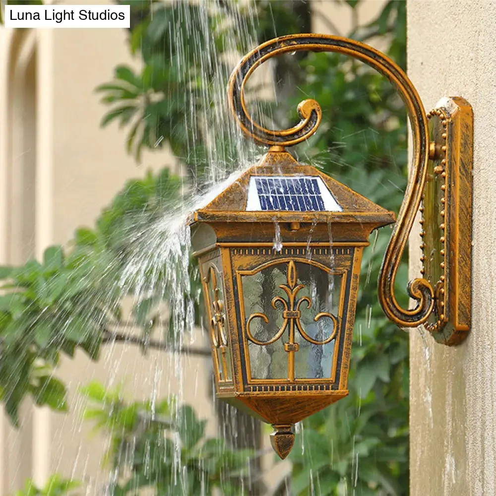 Vintage House LED Solar Wall Light with Metal Fixture and Glass Shade